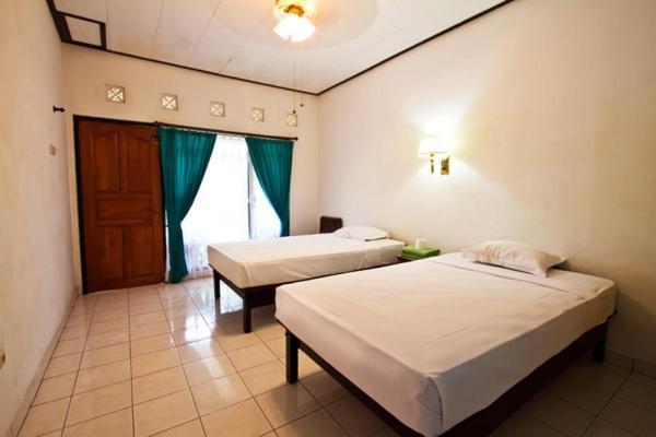 Sandat Mas cabañas Uluwatu Habitación foto